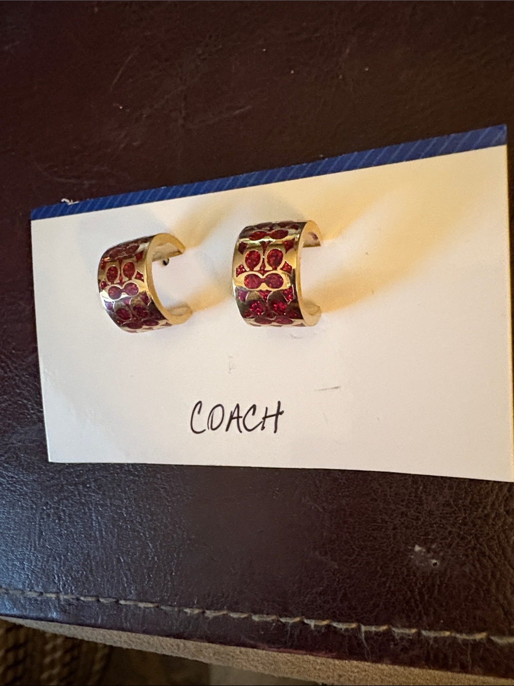 Coach Gold-Tone Hoop Earrings with Red Crystal Inlay